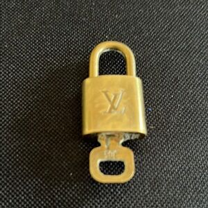 Louis Vuitton Gold Padlock with Key
